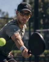 Pickleball player in action from the approved VCN mockup